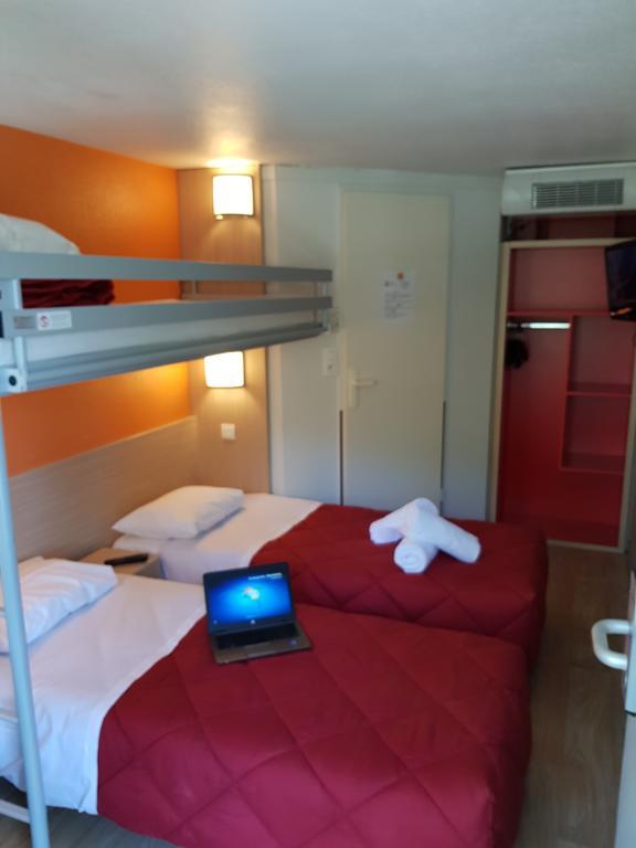 พรีเมียรคลาสลีออนโอเอสทัสซิน Hotel ตาสแซ็ง-ลา-เดอมี-ลูน ภายนอก รูปภาพ