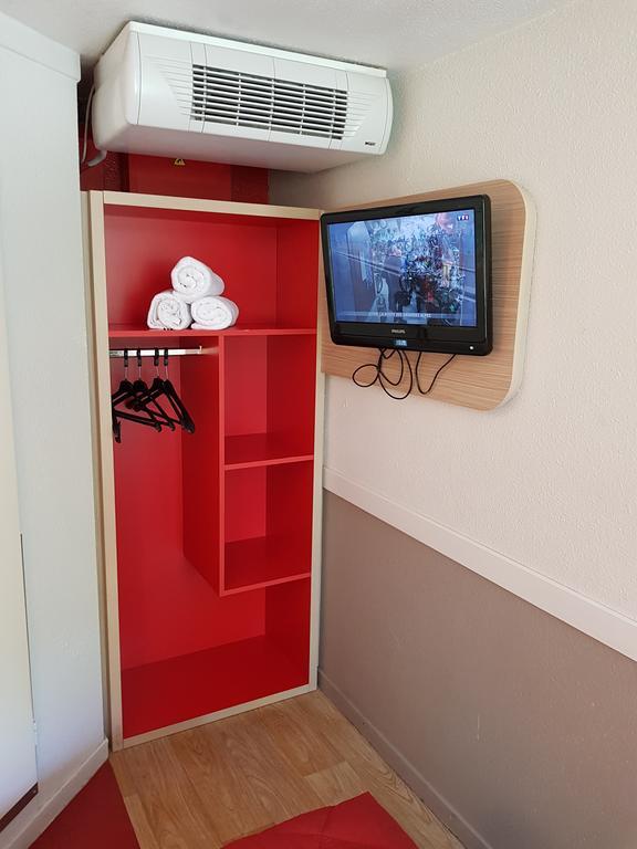 พรีเมียรคลาสลีออนโอเอสทัสซิน Hotel ตาสแซ็ง-ลา-เดอมี-ลูน ภายนอก รูปภาพ