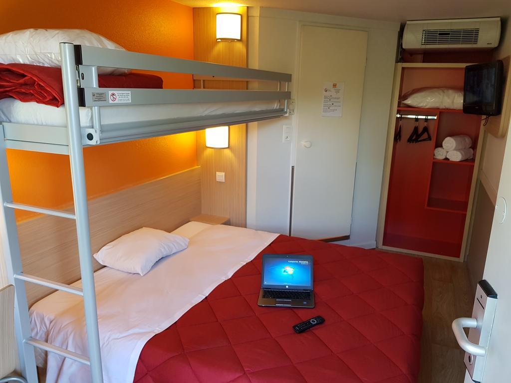 พรีเมียรคลาสลีออนโอเอสทัสซิน Hotel ตาสแซ็ง-ลา-เดอมี-ลูน ภายนอก รูปภาพ
