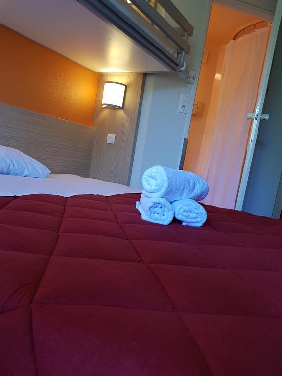 พรีเมียรคลาสลีออนโอเอสทัสซิน Hotel ตาสแซ็ง-ลา-เดอมี-ลูน ภายนอก รูปภาพ