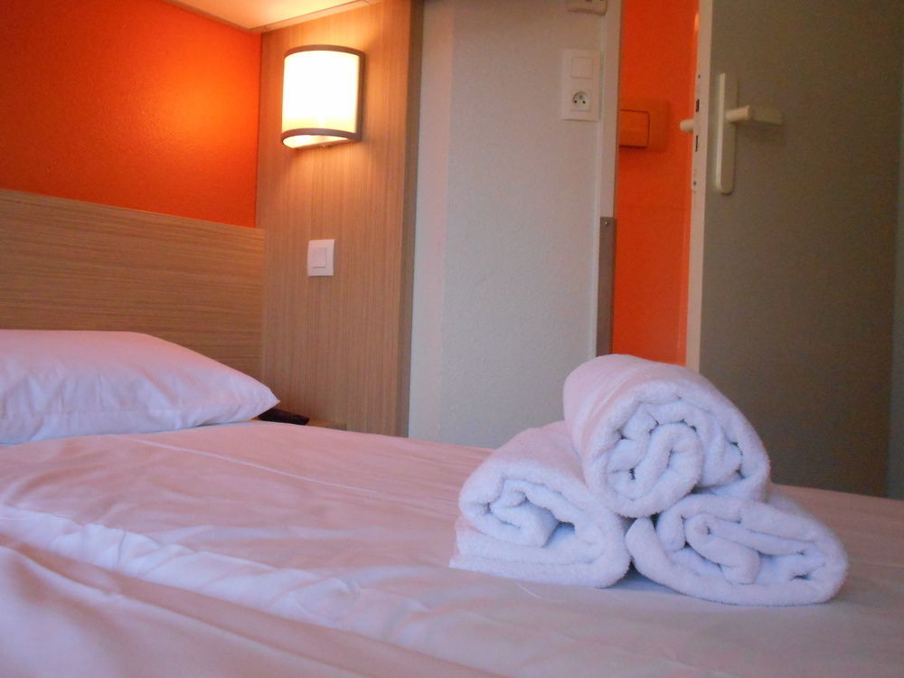 พรีเมียรคลาสลีออนโอเอสทัสซิน Hotel ตาสแซ็ง-ลา-เดอมี-ลูน ภายนอก รูปภาพ