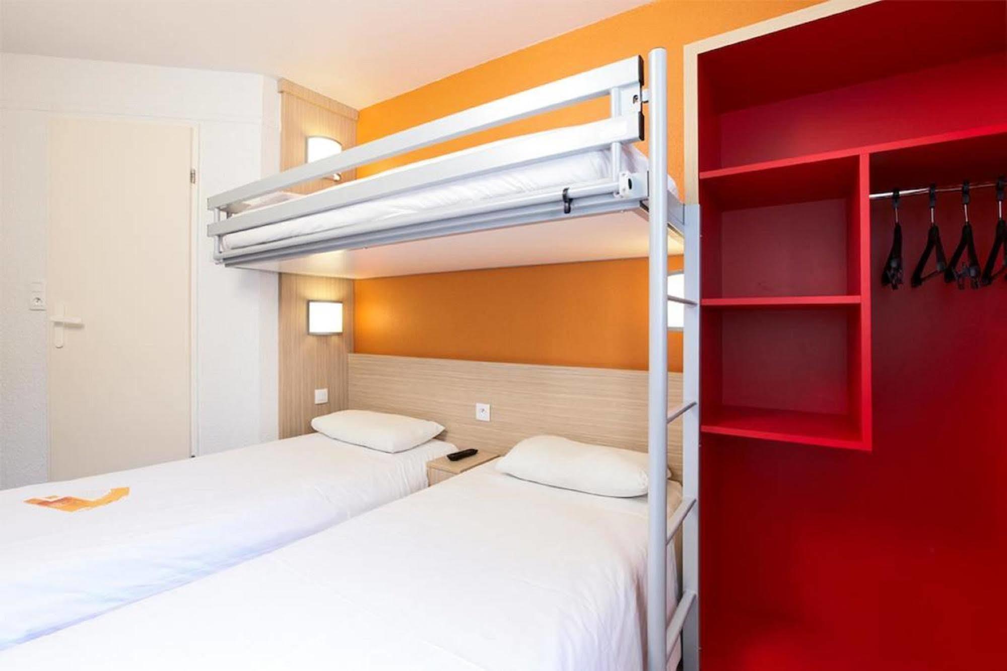 พรีเมียรคลาสลีออนโอเอสทัสซิน Hotel ตาสแซ็ง-ลา-เดอมี-ลูน ภายนอก รูปภาพ
