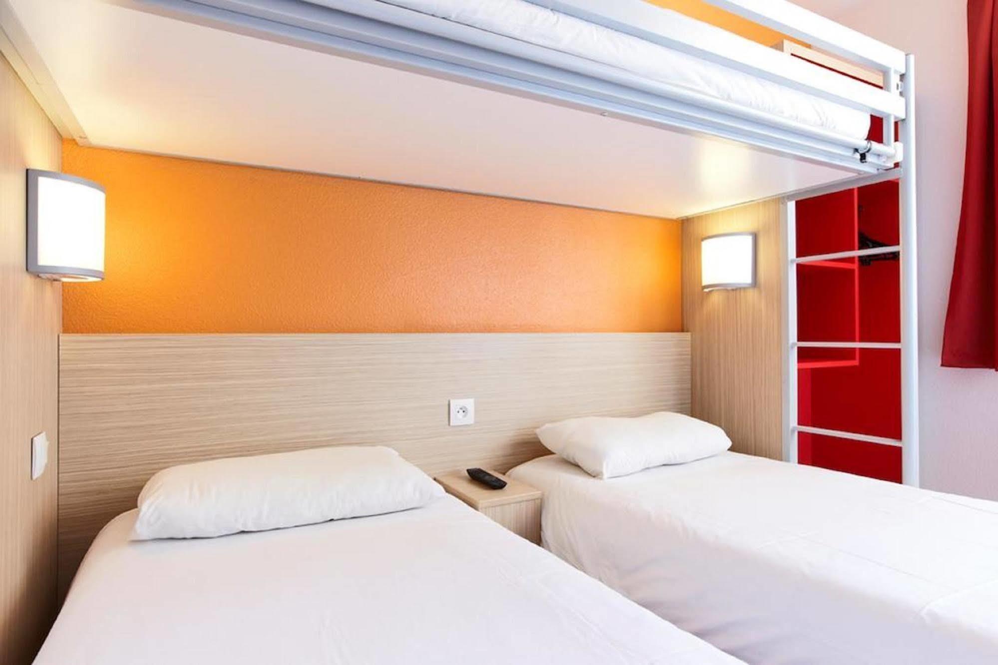 พรีเมียรคลาสลีออนโอเอสทัสซิน Hotel ตาสแซ็ง-ลา-เดอมี-ลูน ภายนอก รูปภาพ
