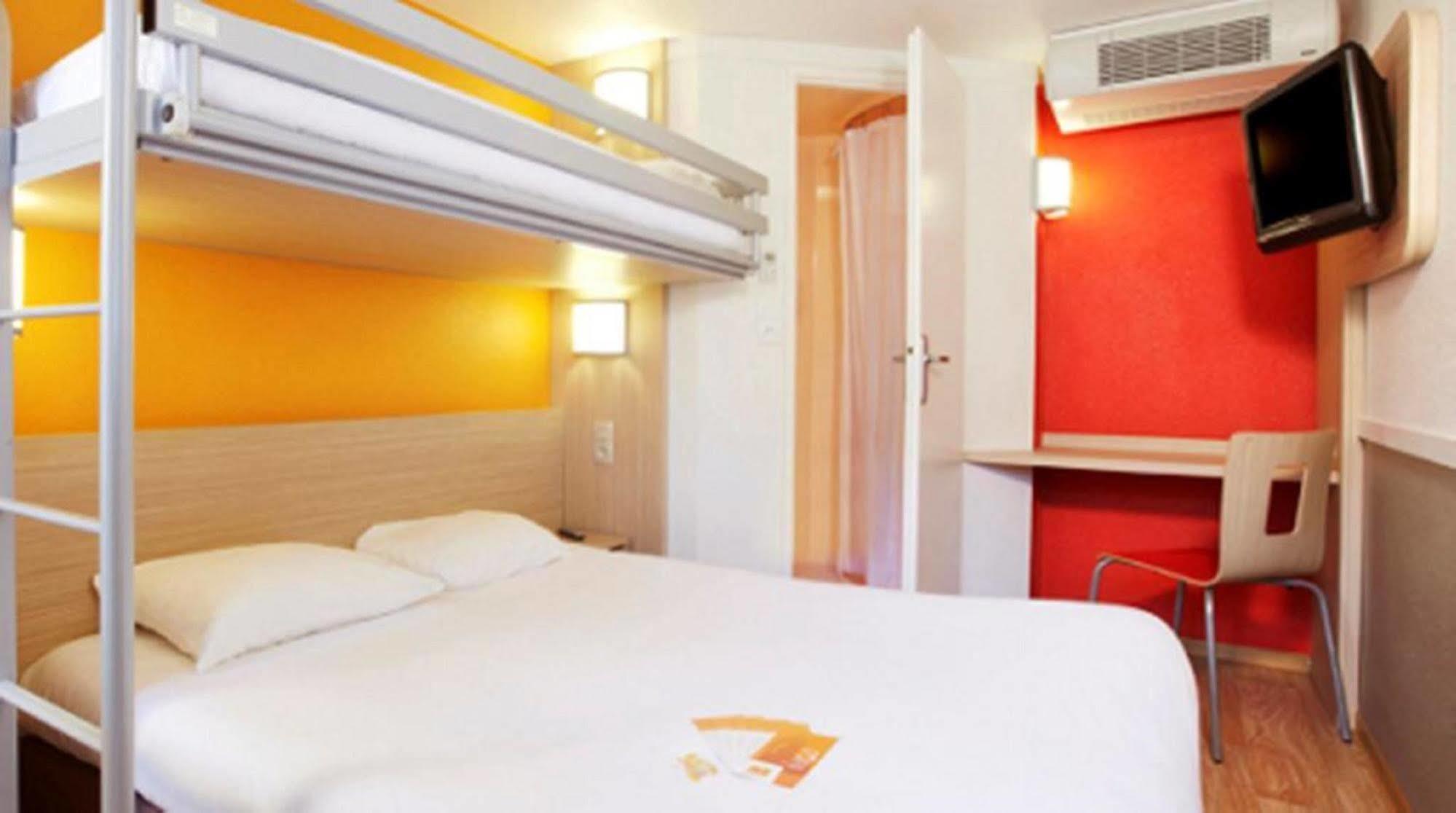 พรีเมียรคลาสลีออนโอเอสทัสซิน Hotel ตาสแซ็ง-ลา-เดอมี-ลูน ภายนอก รูปภาพ